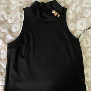 Women’s sleeveless blouse turtleneck